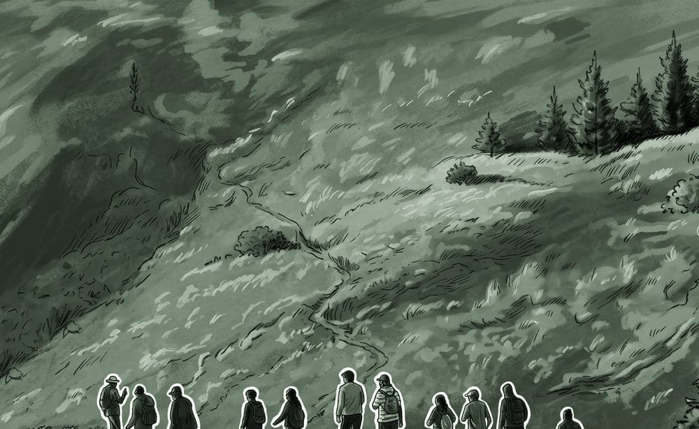 Community walking single file uphill